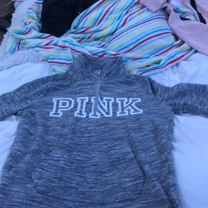 A pink quarter zip